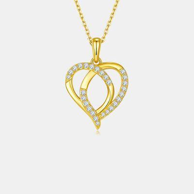 a gold necklace with two intertwined hearts