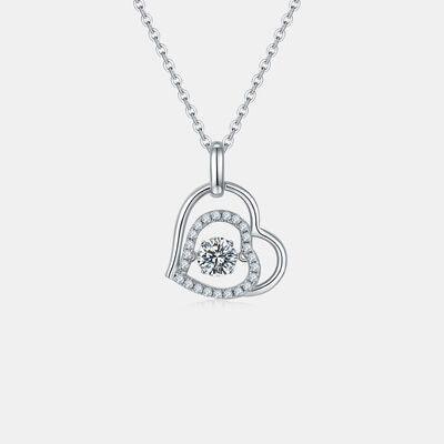 a diamond heart pendant on a chain