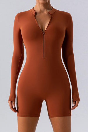 a woman wearing a bodysuit with a zipper
