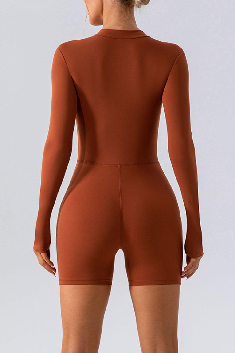 a woman in a brown bodysuit