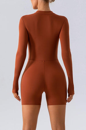 a woman in a brown bodysuit