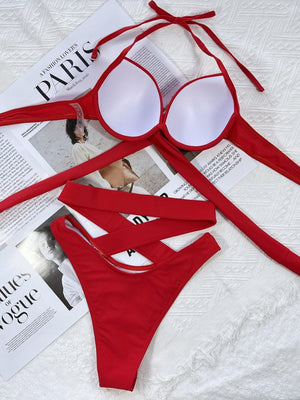a woman's red bikinisuit with a pair of white bras