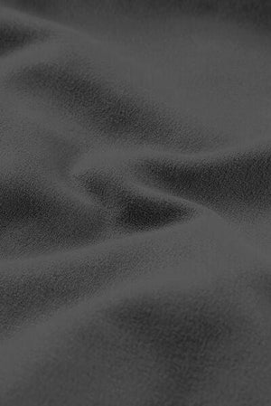 a black and white photo of a blanket