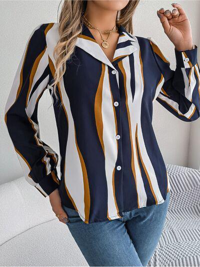 a woman wearing a striped shirt and jeans
