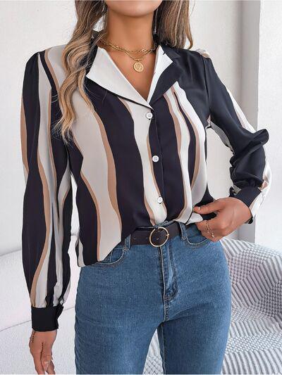 a woman wearing a striped shirt and jeans