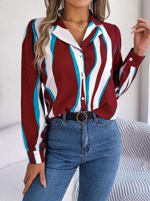 a woman wearing a red, white, and blue striped shirt