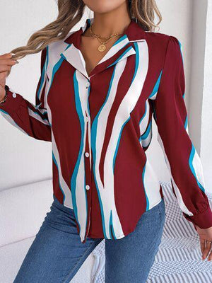 a woman wearing a red, white and blue shirt