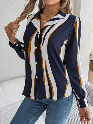 a woman wearing a blue and white striped shirt