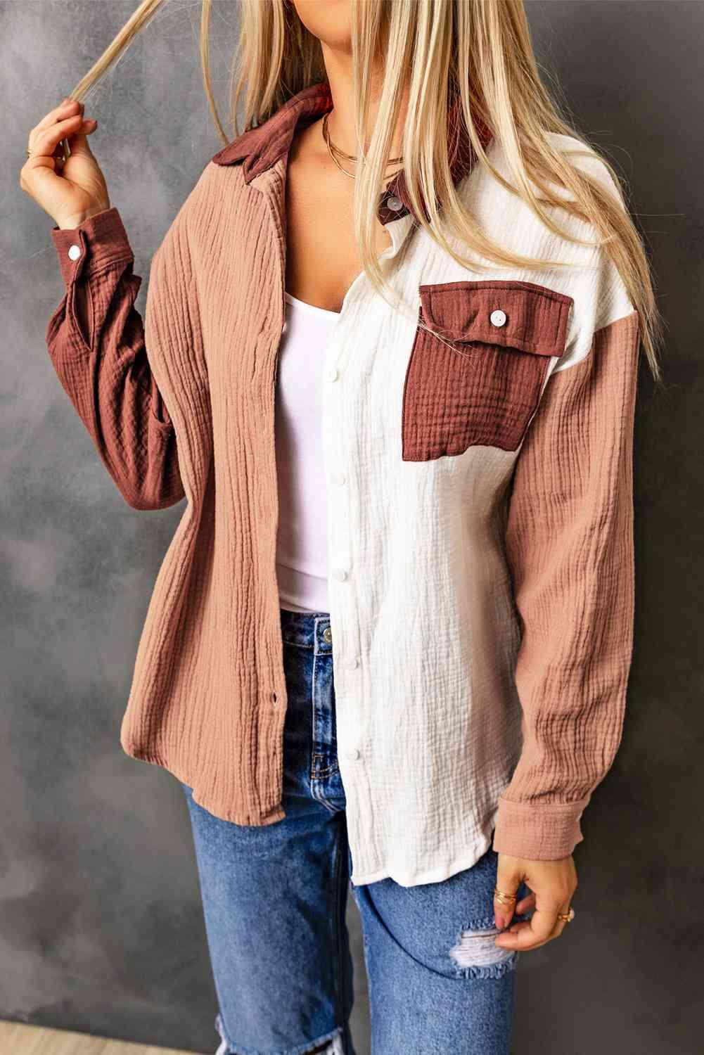 a woman wearing a brown and white jacket and jeans