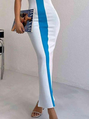 a woman in a white and blue dress