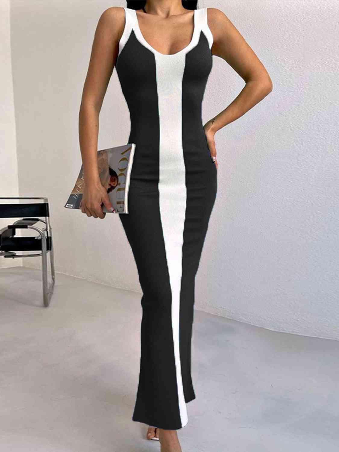 a woman in a black and white dress