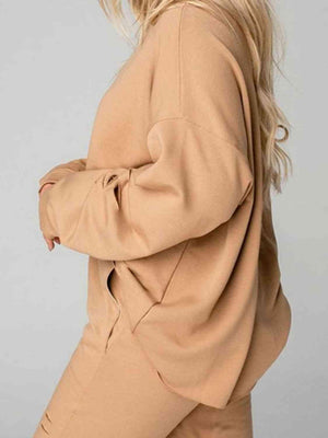 a woman with blonde hair is posing for a picture