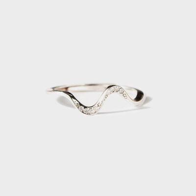 a silver ring with a wave design on it