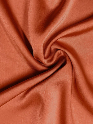 a close up view of a red fabric