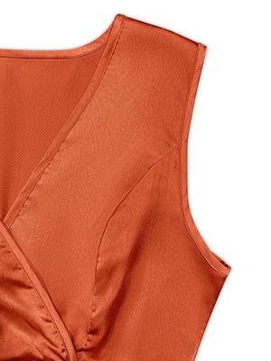 an orange top with a knot on the front