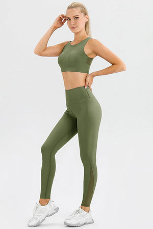 a woman in a green sports bra top and leggings