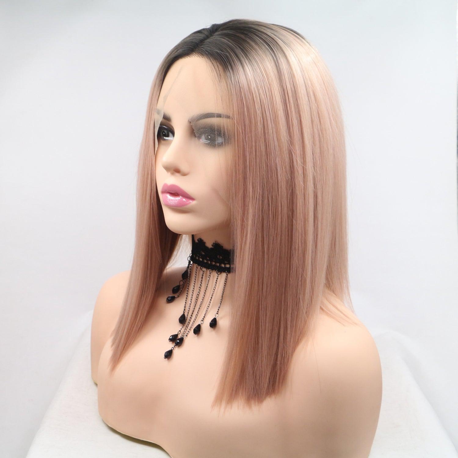 a mannequin head with a pink wig and necklace