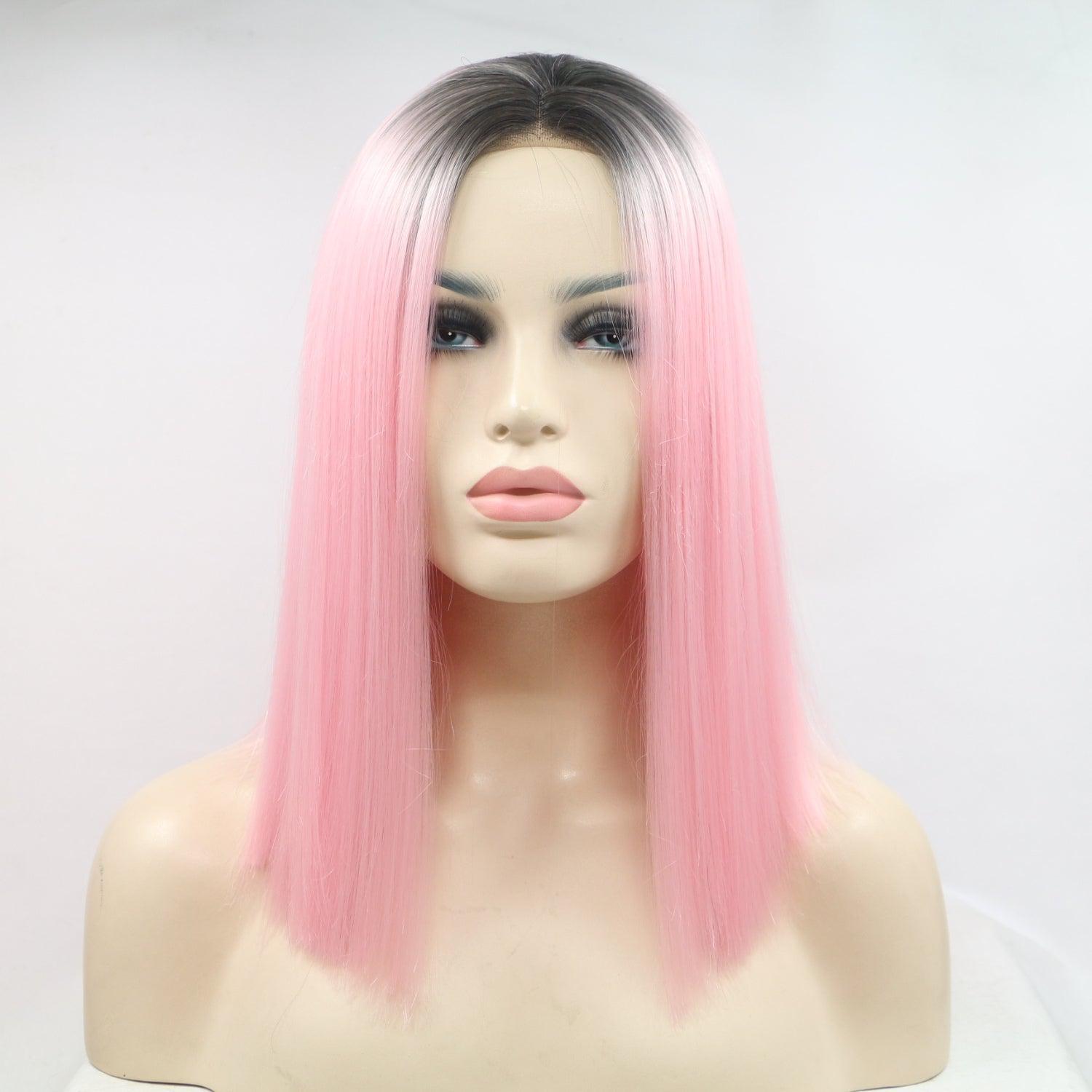 a mannequin head with pink and black hair