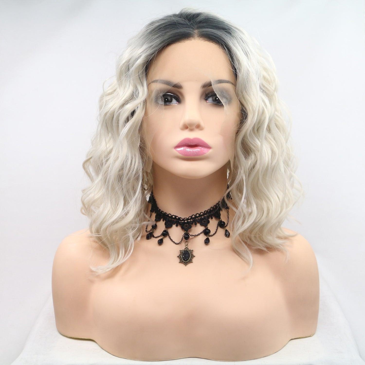 a mannequin head with white hair and a black necklace