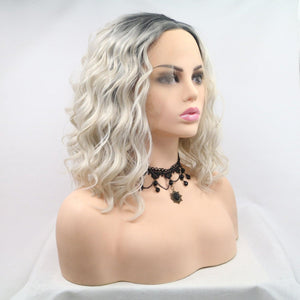 a blonde wig with grey hair on a mannequin head