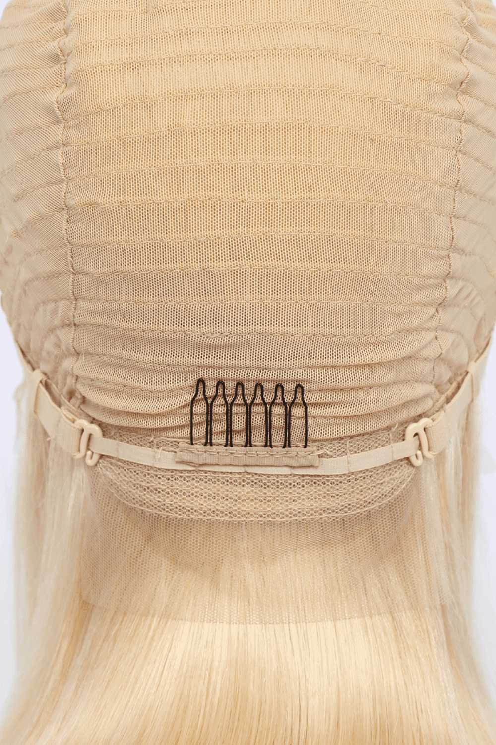 a close up of a hair piece with hair pins on it