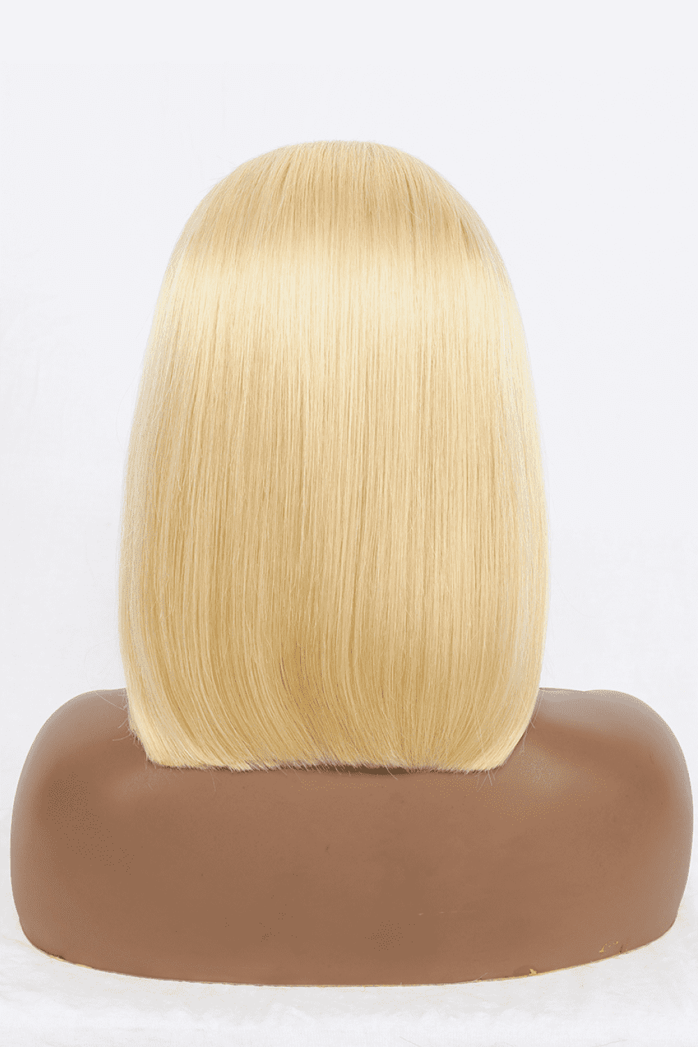 a blonde wig on a mannequin head
