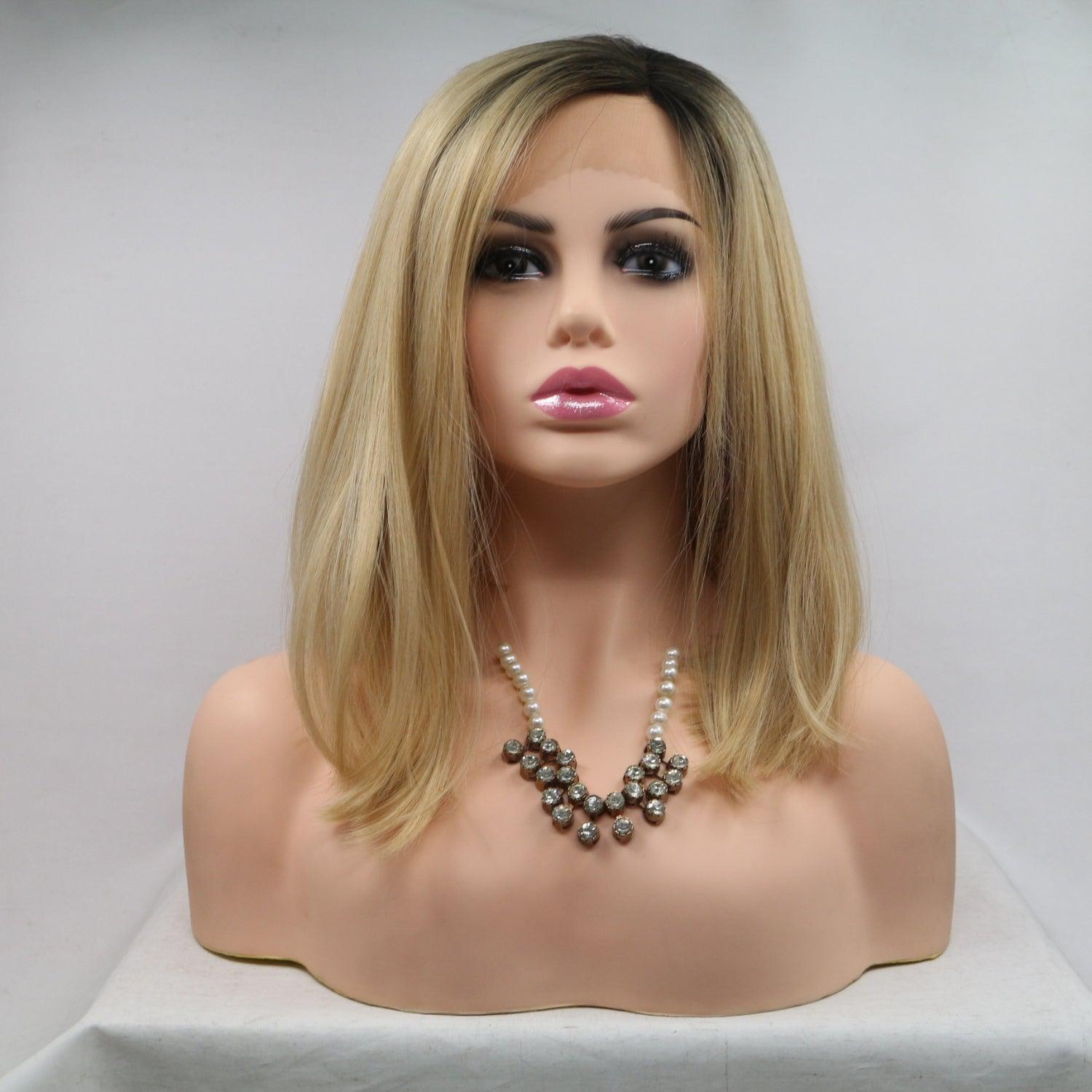 a mannequin head with a necklace on it
