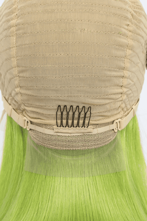 the back of a wig with green hair