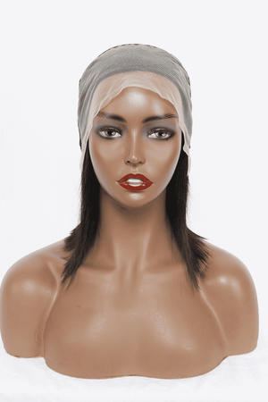 a mannequin head with a white turban on top of it