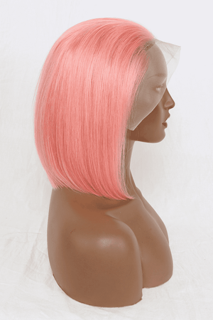 a wig with pink hair on a mannequin head