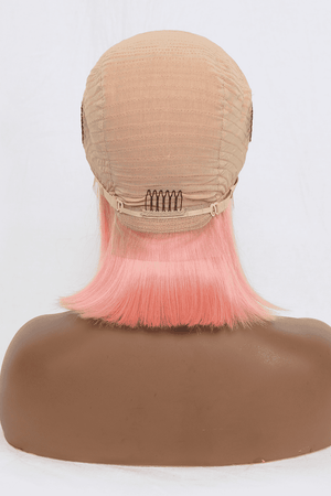 a wig with pink hair on top of a mannequin head