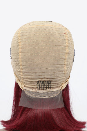 a wig with a piece of hair on top of it