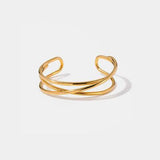 a gold ring on a white background