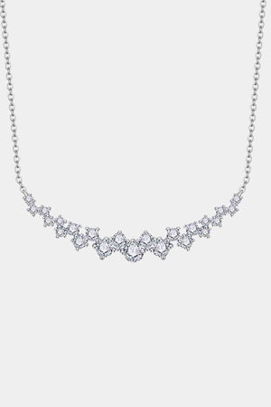 a diamond necklace on a white background