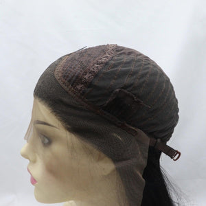 a wig on a mannequin head wearing a hat
