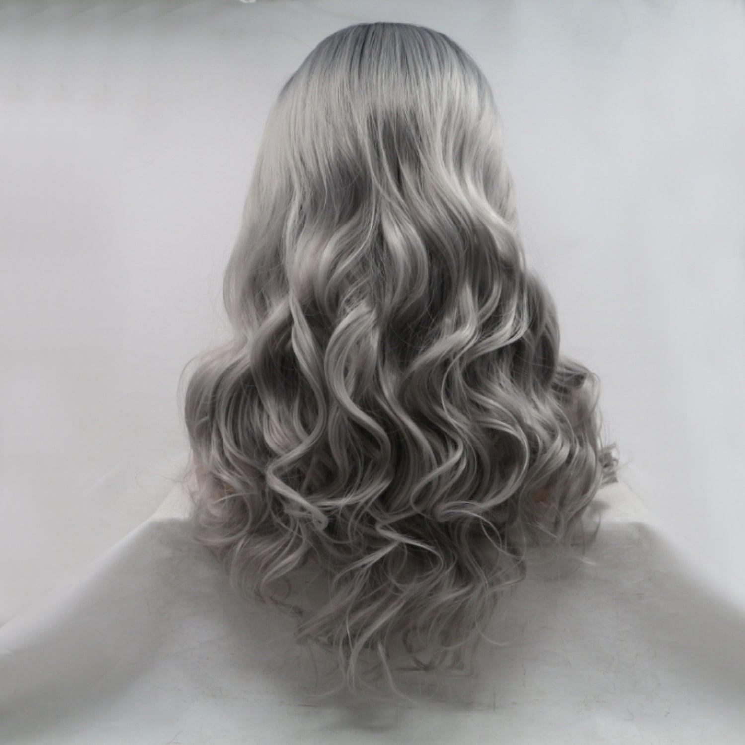 the back of a woman's head with grey hair