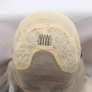 a mannequin's head with a piece of hair on top of it