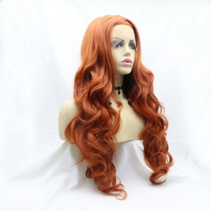 a wig with long red hair on a mannequin head