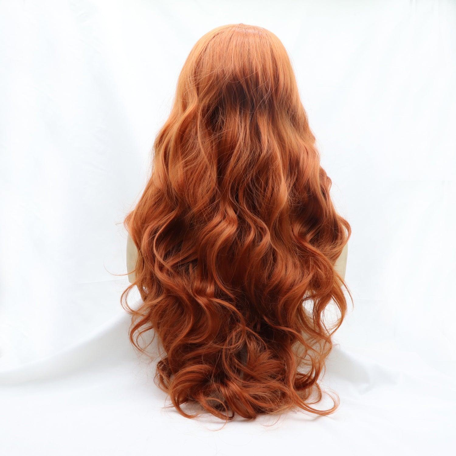 a woman's long red curly hair on a white background