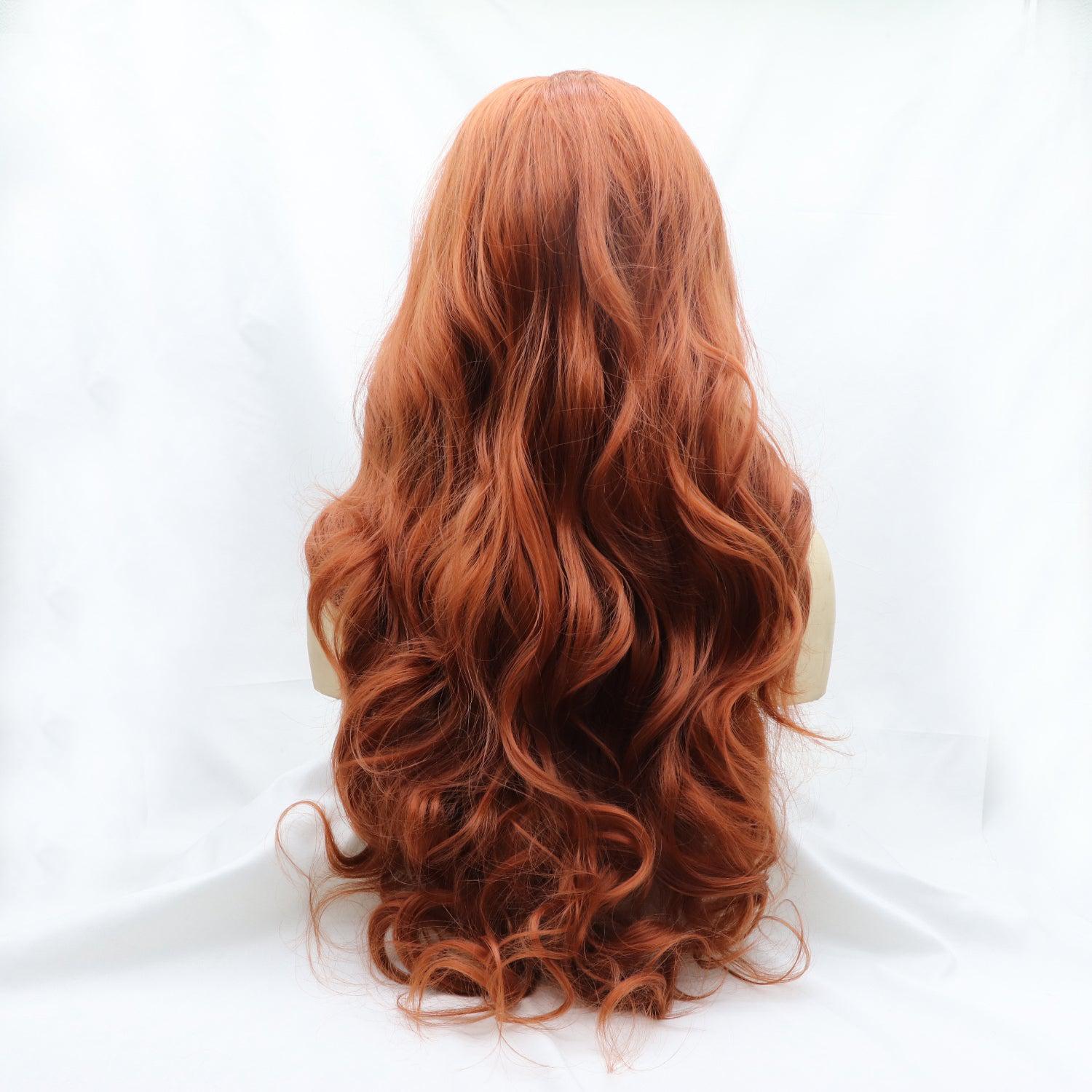 a close up of a woman's long red hair