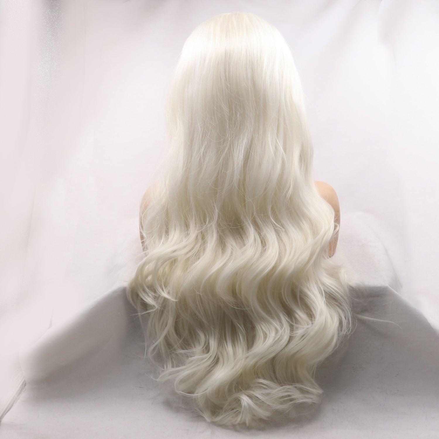 a white wig sitting on top of a white table