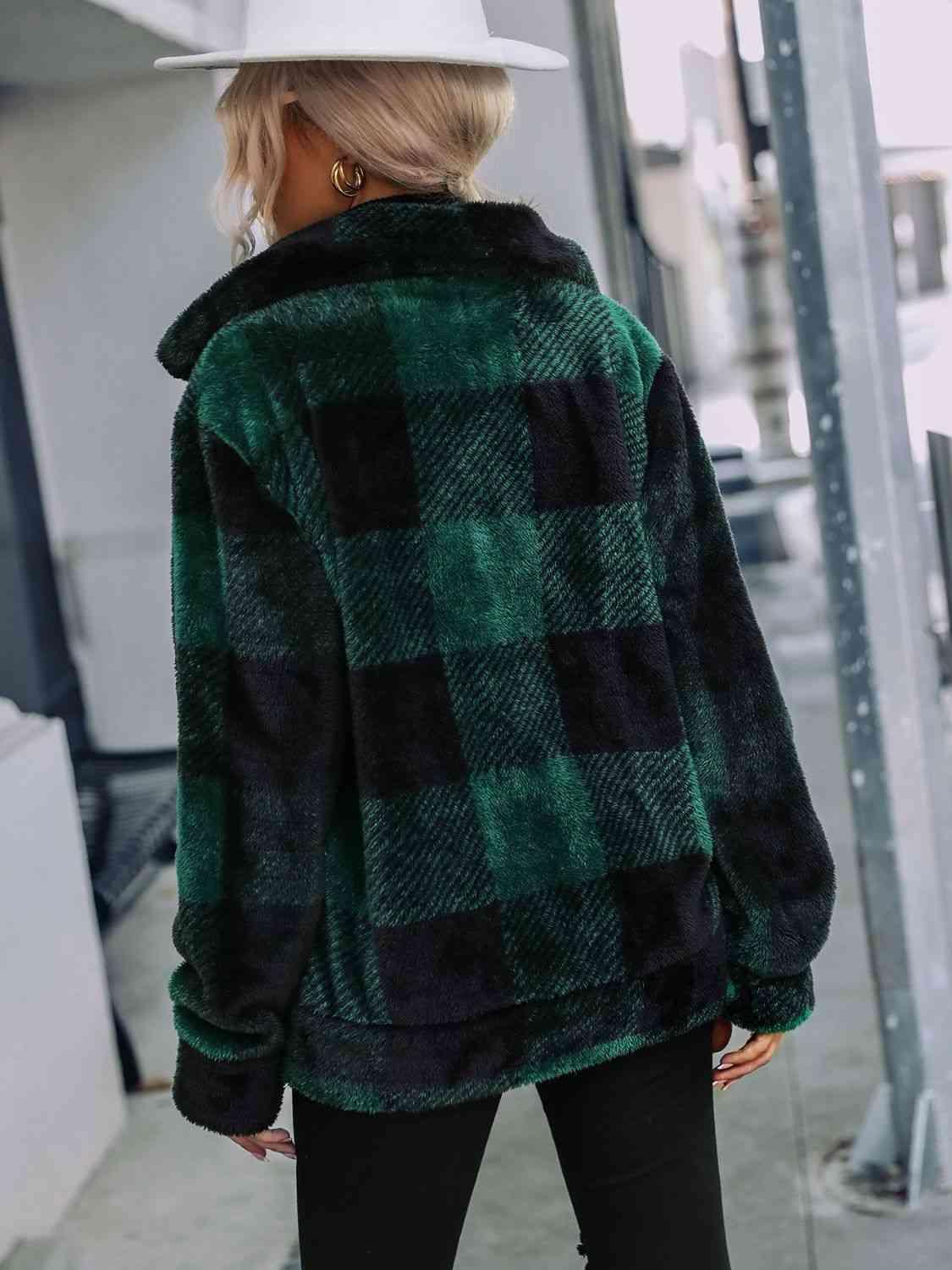 a woman wearing a green and black checkered coat