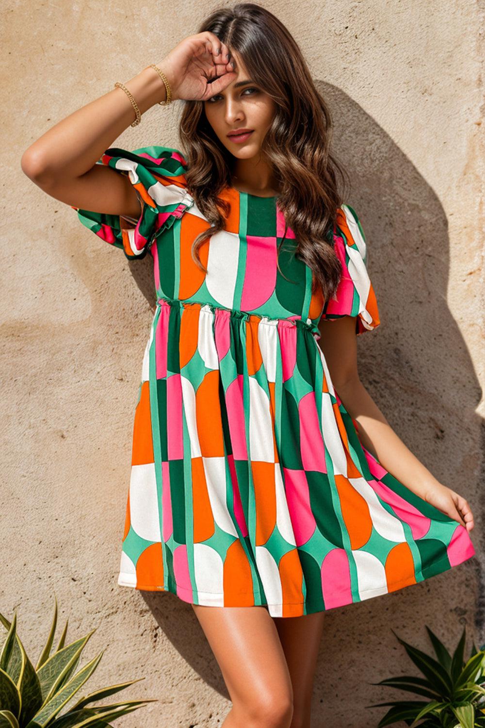 a woman in a colorful dress posing for a picture