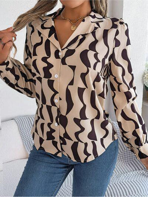 a woman wearing a shirt with a pattern on it