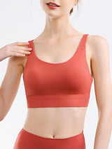 a woman in a red sports bra top