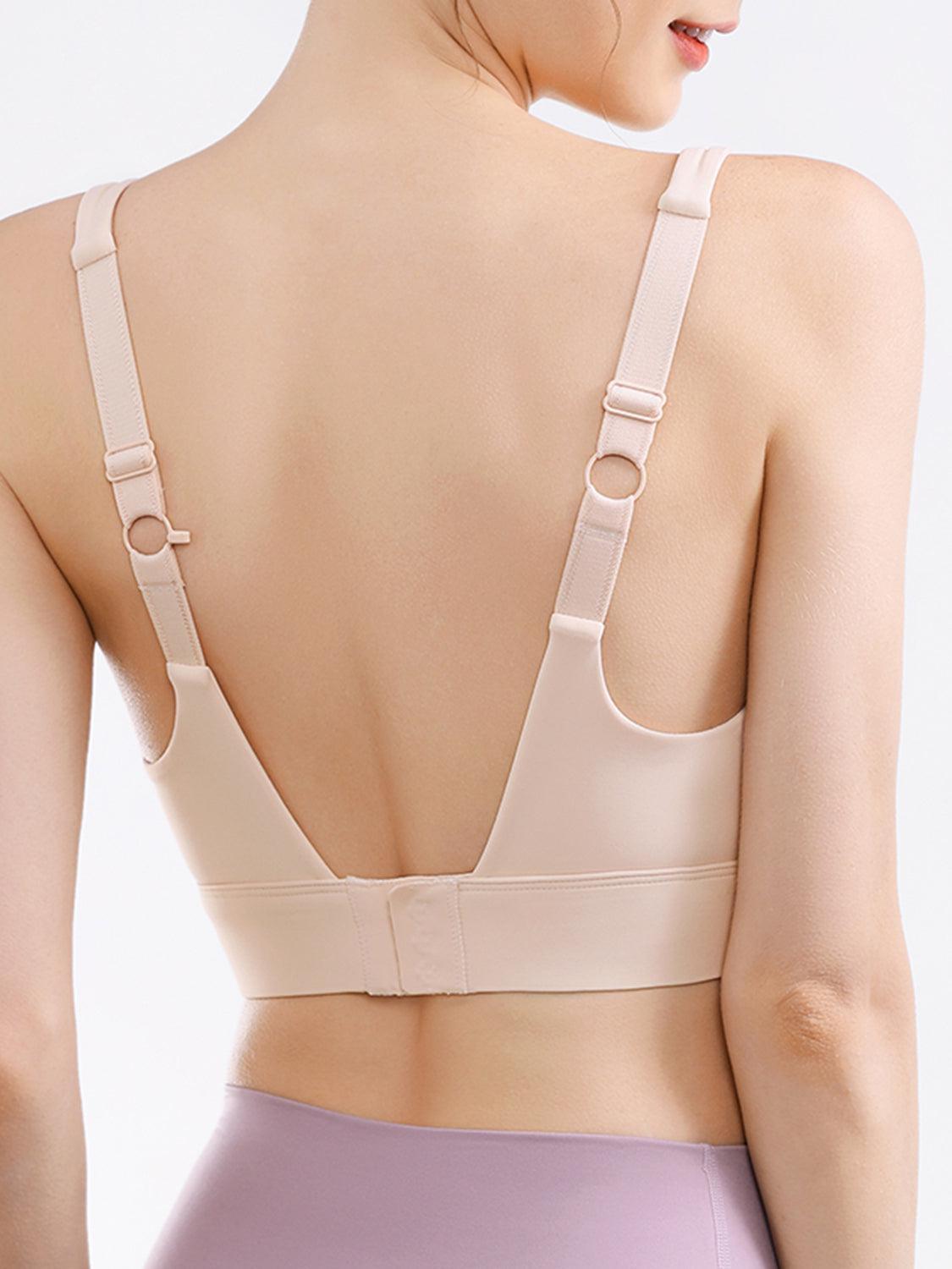 a woman wearing a bra with straps on her back
