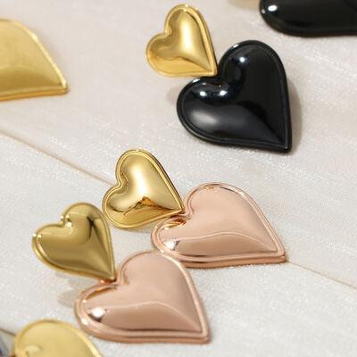 a group of heart shaped pins sitting on top of a table