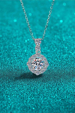 a diamond necklace on a blue background