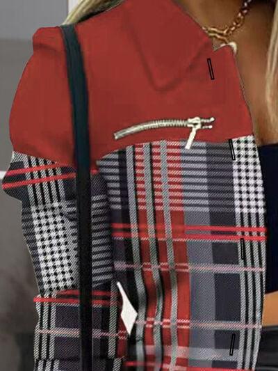 a woman wearing a red shirt and plaid skirt