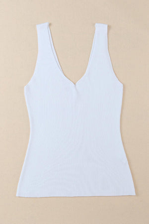 a women's white tank top on a beige background